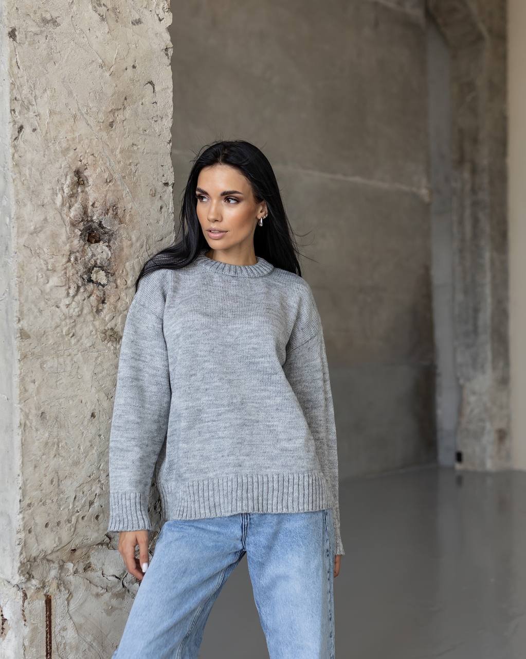 Nero šviesiai pilkas megztinis
